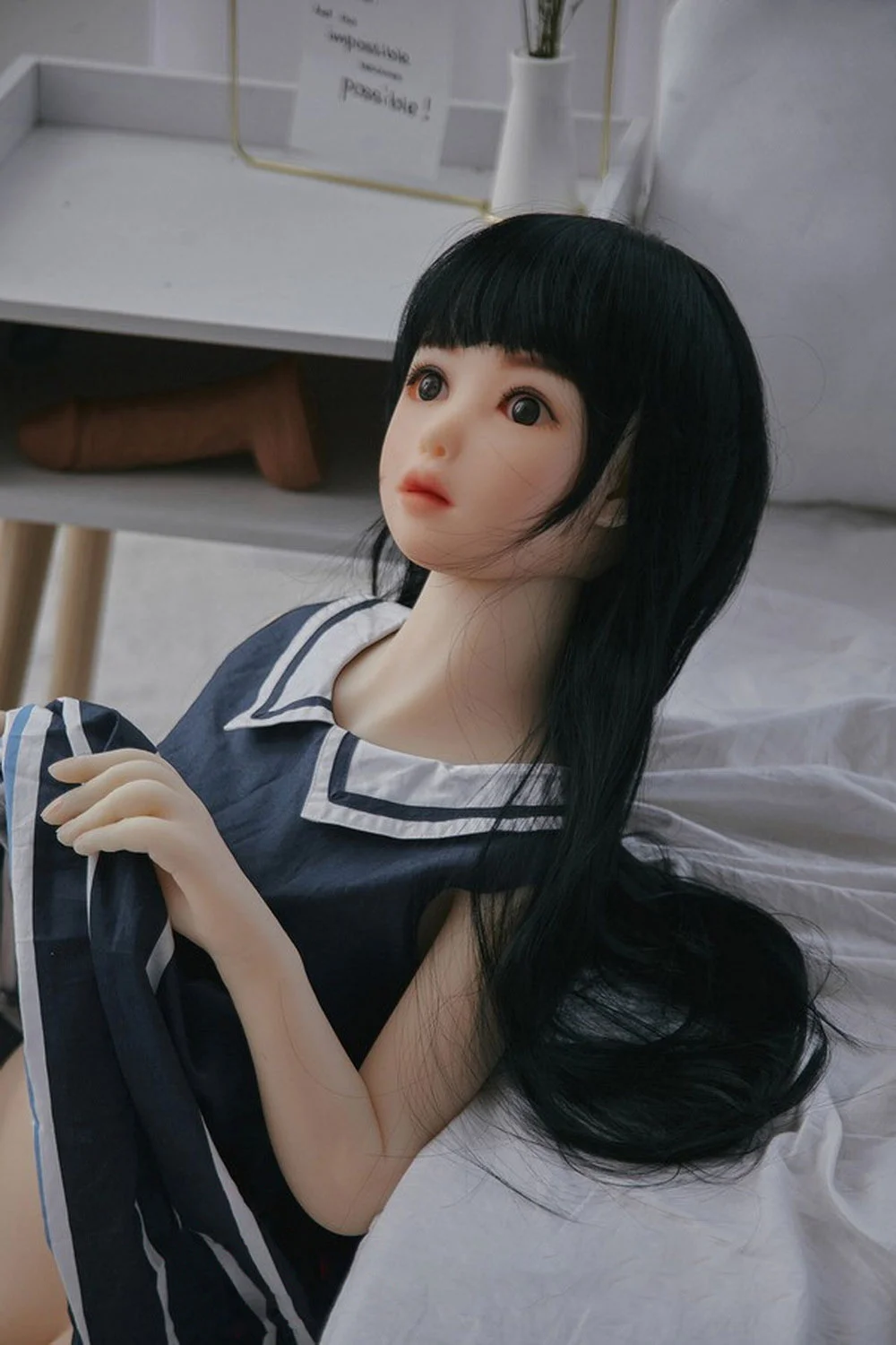 Flat chested sex doll with black long hair