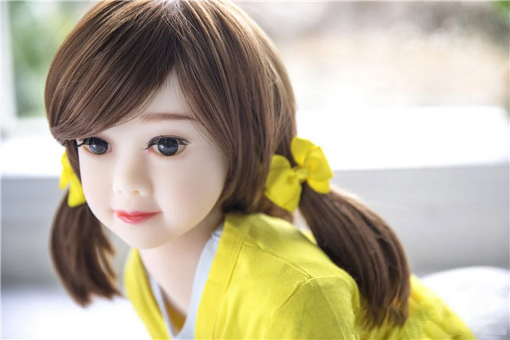 Mini sex doll in yellow clothes