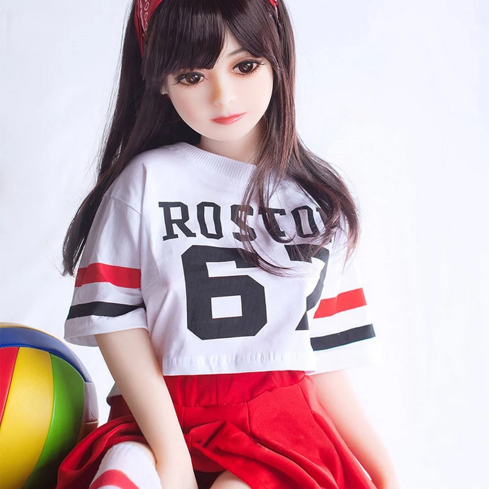 Mini sex doll with hand between thighs