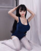 Mini sex doll with hands holding head
