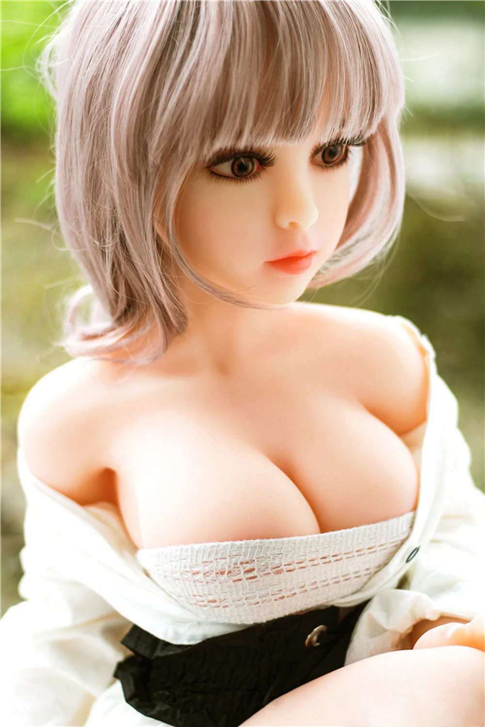 Mini sex doll with short pink hair