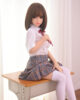 Sex doll with hands on chest