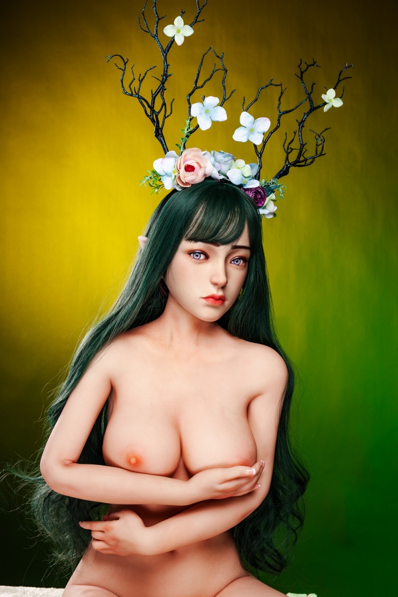 Silicone sex doll with naked arms around her chest