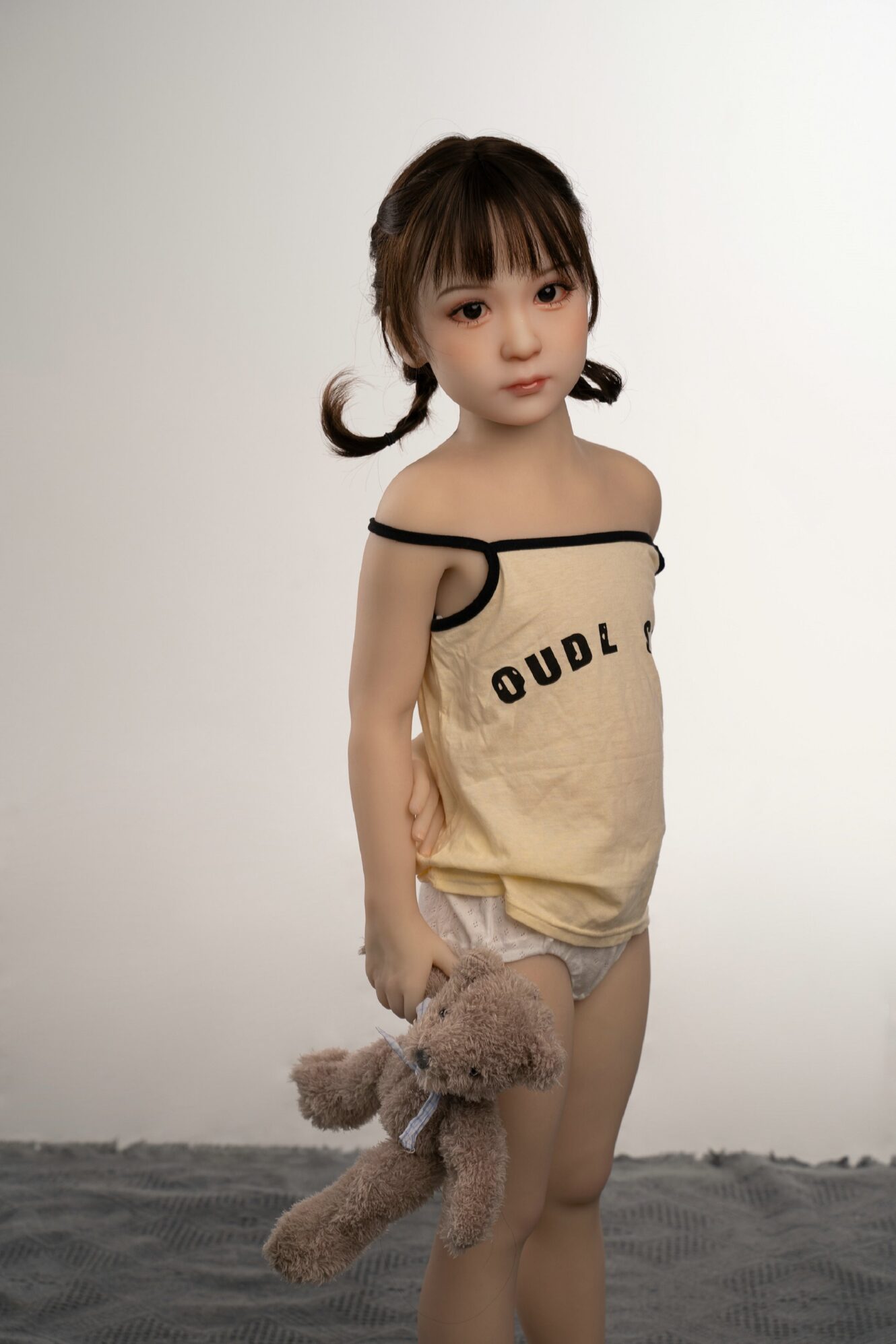 cheap teen girl looking doll